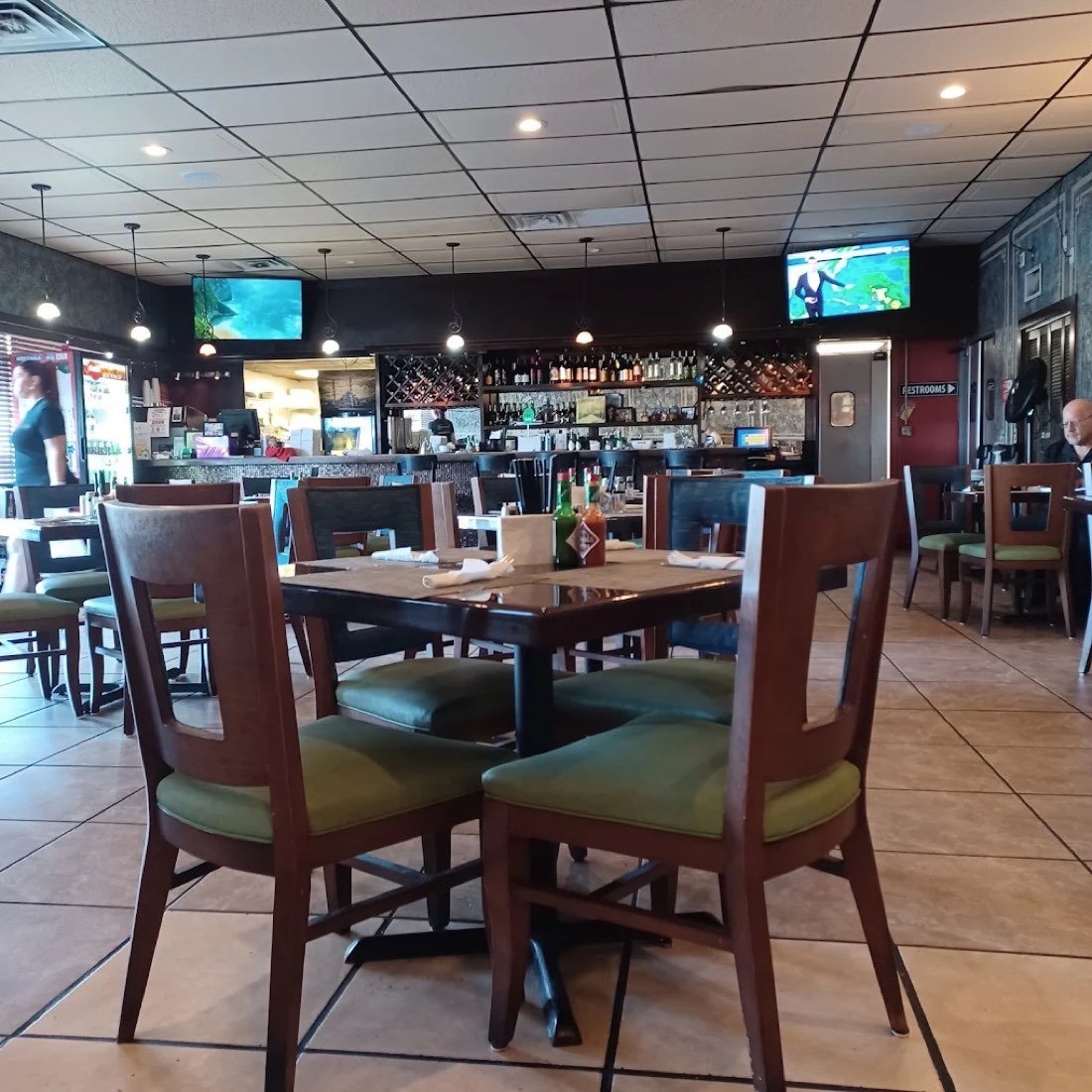 Table seating and bar inside Kennedy Cafe