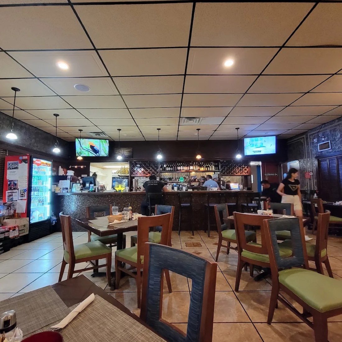 Warm dining room and bar at Kennedy Cafe